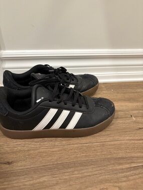 adidas Black Sneakers with White Stripes and Gum Sole-look